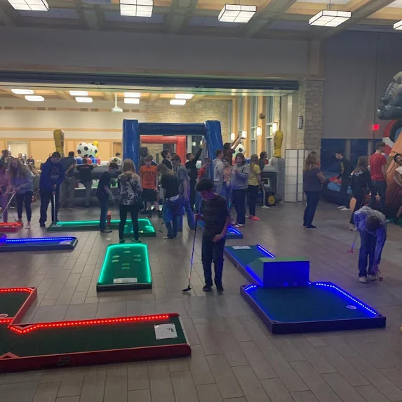 Indoor mobile mini golf course at a Points Up event